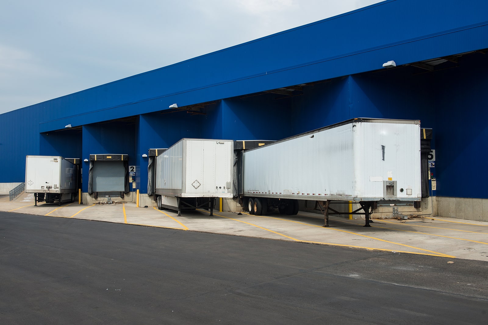 Image of storage trailers behind a building